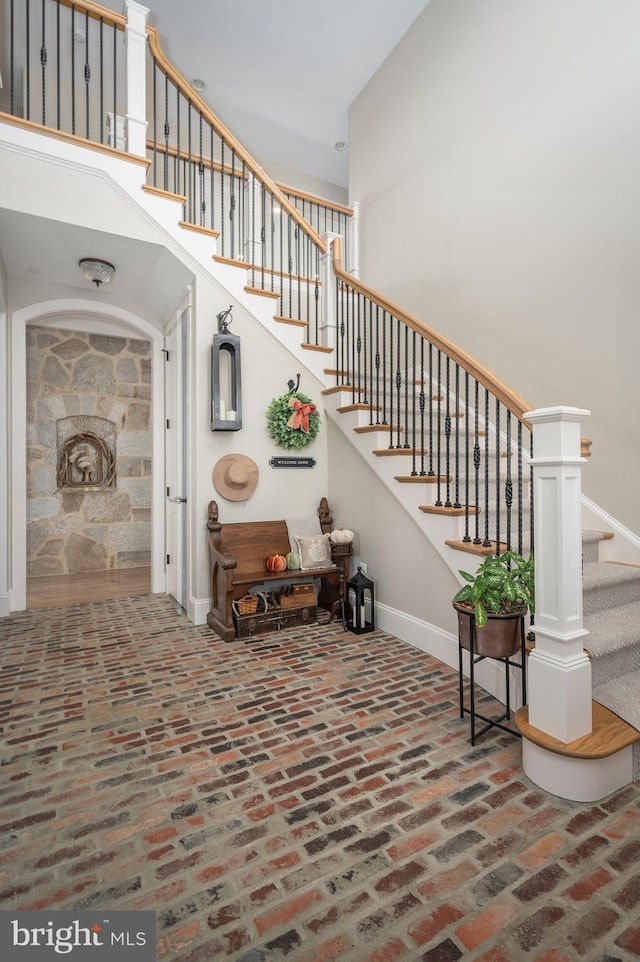 stairway with a high ceiling