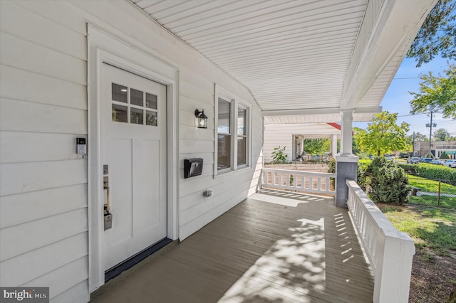 wooden terrace with covered porch