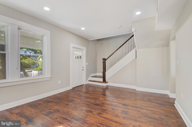 foyer entrance with dark hardwood / wood-style flooring