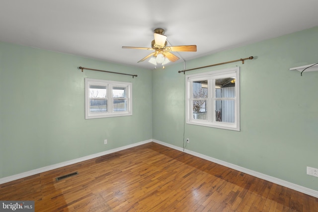 unfurnished room featuring wood-type flooring and ceiling fan