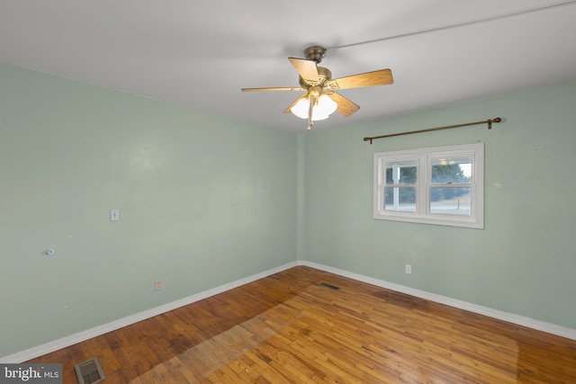 unfurnished room featuring ceiling fan and light hardwood / wood-style floors