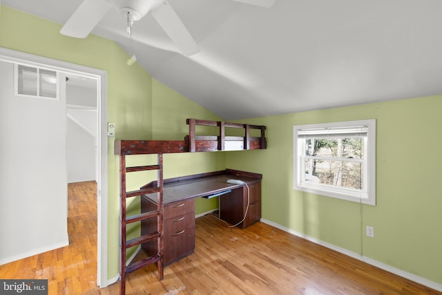 interior space featuring vaulted ceiling, ceiling fan, and light hardwood / wood-style flooring