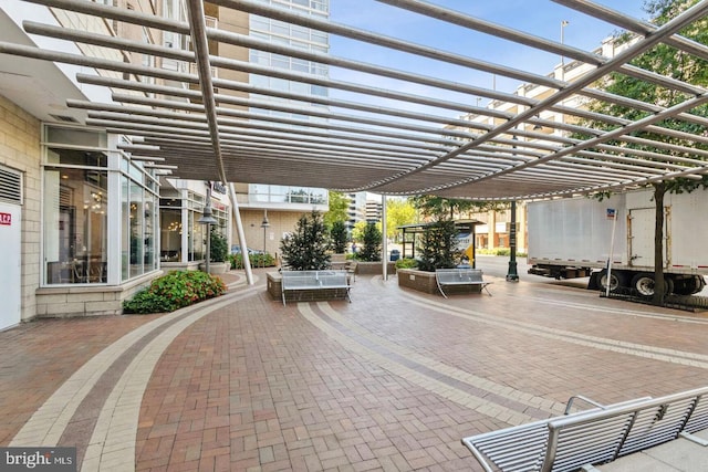 view of patio / terrace featuring a pergola