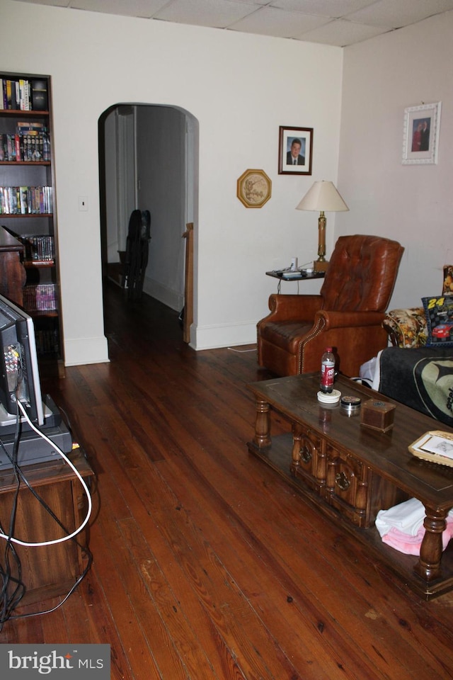 living room with dark wood-type flooring