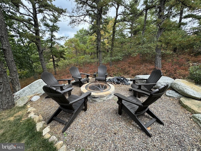 view of patio featuring a fire pit