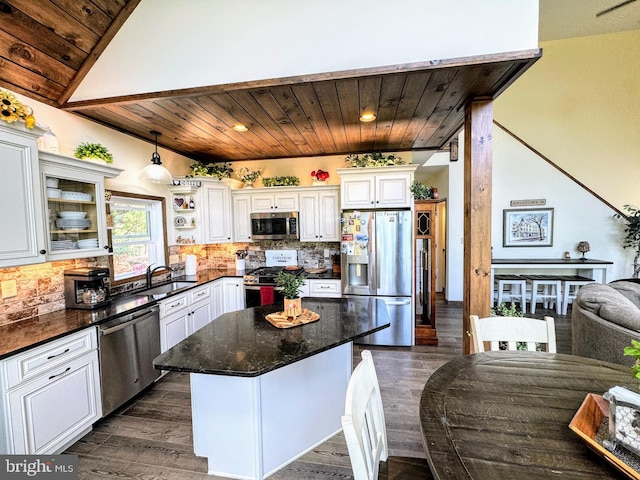 kitchen with white cabinets, wooden ceiling, lofted ceiling, and appliances with stainless steel finishes