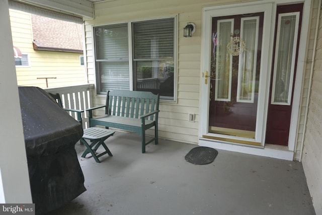 view of patio featuring a porch