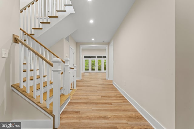 hall with light wood-type flooring