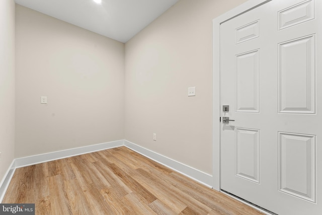 spare room featuring light hardwood / wood-style floors