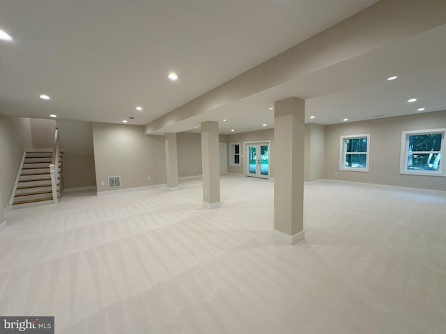 basement with light colored carpet