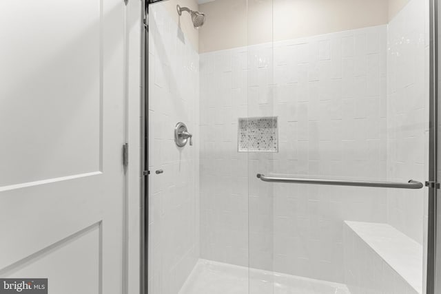 bathroom with an enclosed shower