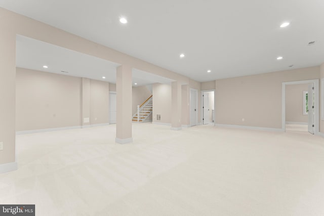 basement with light colored carpet