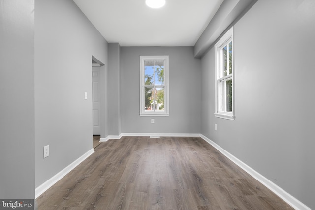 empty room featuring hardwood / wood-style floors