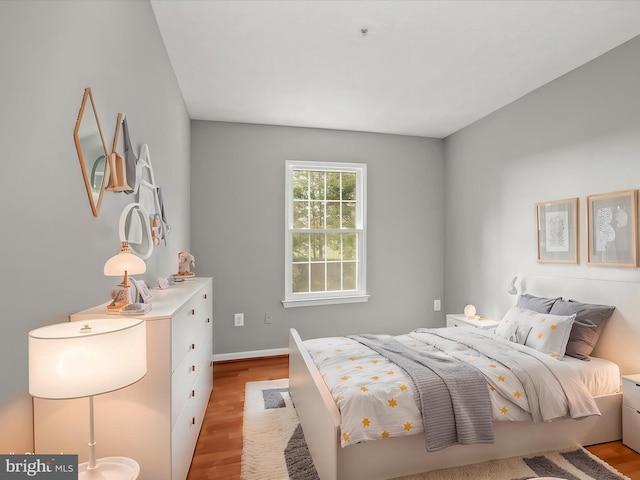 bedroom featuring light wood-type flooring