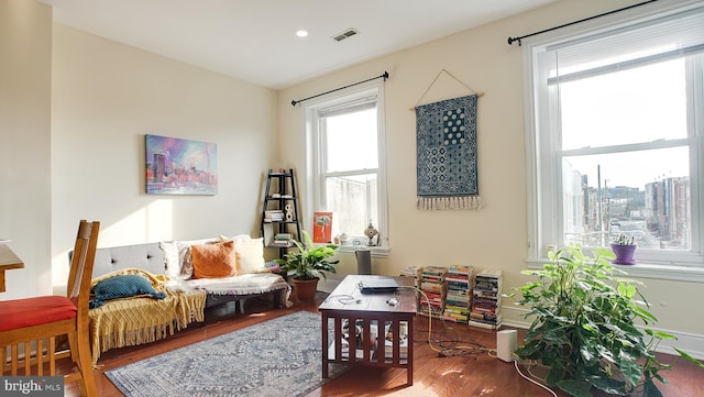 sitting room featuring hardwood / wood-style floors