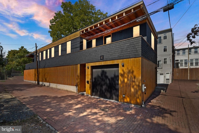 view of front of property featuring a garage