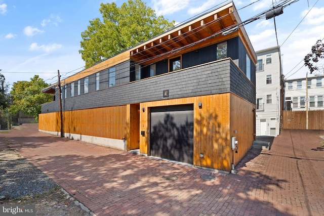 view of front of property featuring a garage