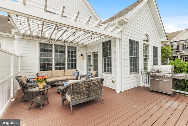 deck with a pergola, outdoor lounge area, and a grill