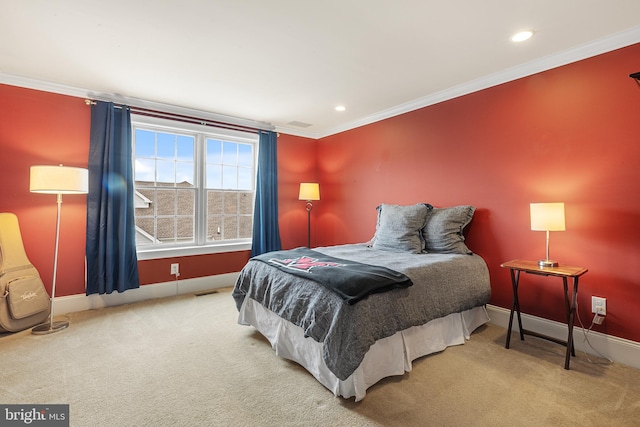 carpeted bedroom with ornamental molding