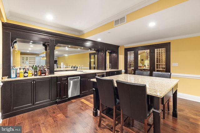 bar with stainless steel dishwasher, light stone counters, crown molding, and sink