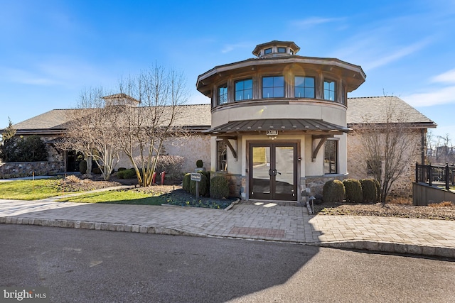 view of front of house with french doors