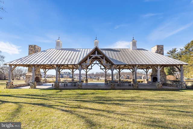 view of home's community with a gazebo and a lawn