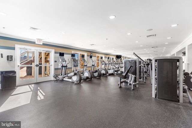 gym featuring crown molding