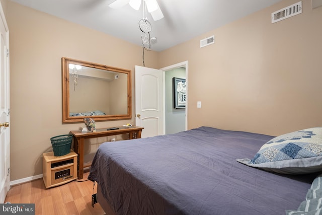 bedroom featuring hardwood / wood-style floors and ceiling fan