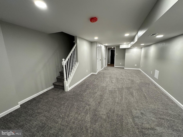 basement featuring carpet flooring