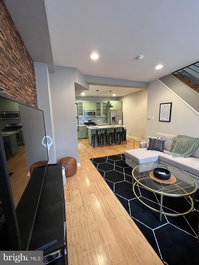 living room with hardwood / wood-style floors