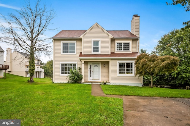 view of front facade featuring a front yard