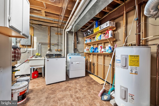 basement with washer and clothes dryer, sink, and electric water heater