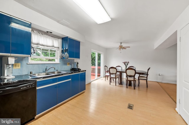 kitchen featuring dishwasher, light hardwood / wood-style floors, sink, ceiling fan, and blue cabinetry