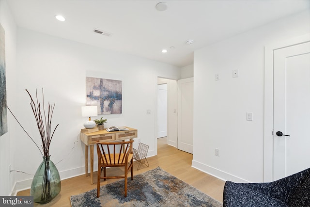 sitting room with light hardwood / wood-style floors