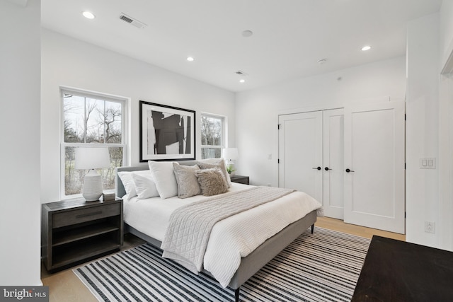 bedroom with light hardwood / wood-style flooring