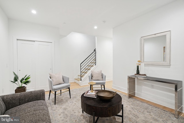 living area with light hardwood / wood-style floors