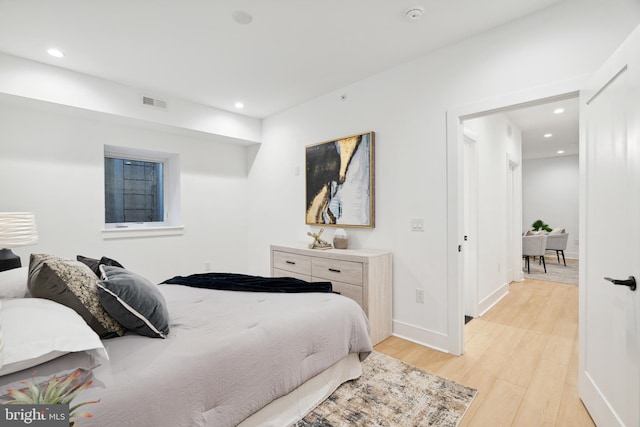 bedroom featuring light hardwood / wood-style flooring