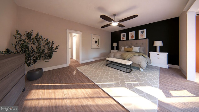 bedroom with hardwood / wood-style flooring and ceiling fan