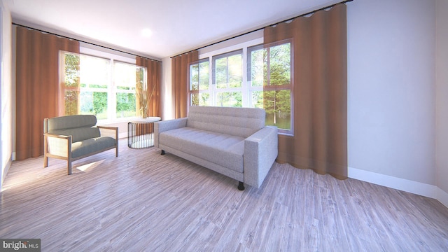 living area with hardwood / wood-style flooring