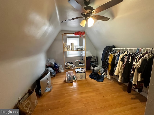 additional living space featuring ceiling fan, lofted ceiling, and light hardwood / wood-style flooring