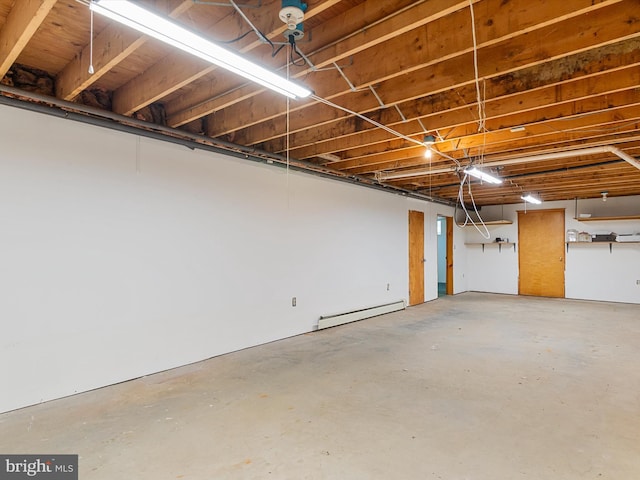 basement featuring a baseboard radiator