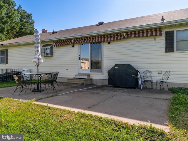 back of property featuring a patio area