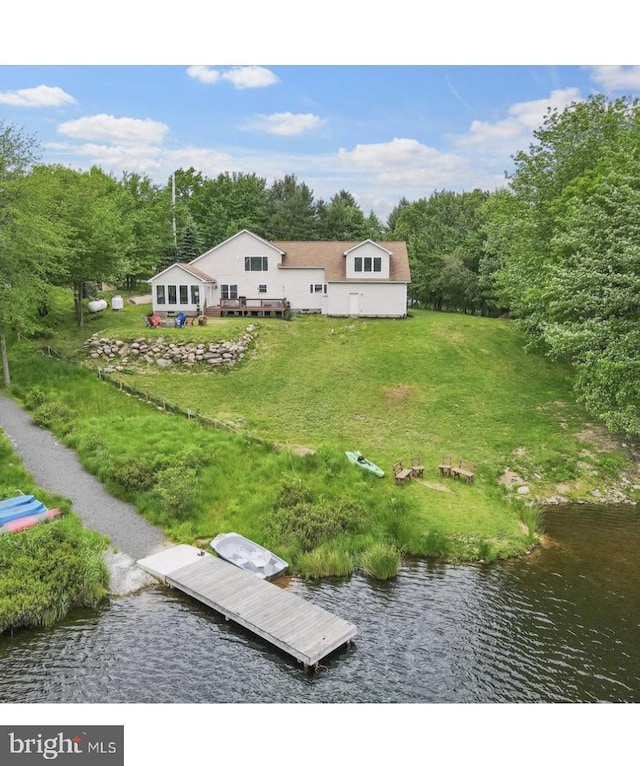 exterior space with a water view