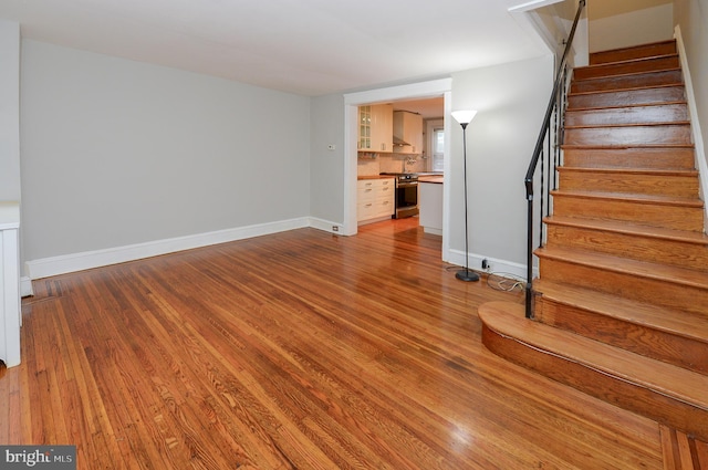 unfurnished living room featuring light hardwood / wood-style floors