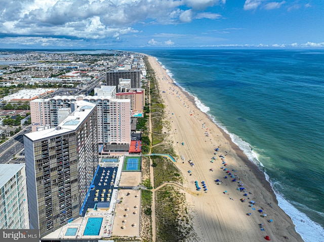 drone / aerial view with a view of the beach and a water view