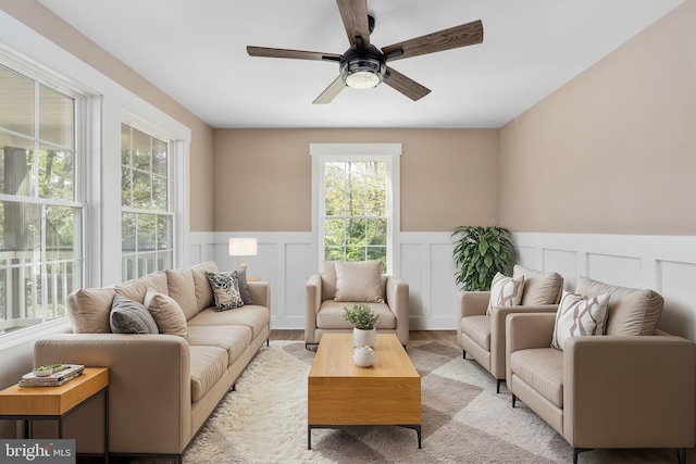 interior space featuring a healthy amount of sunlight, ceiling fan, and light hardwood / wood-style flooring