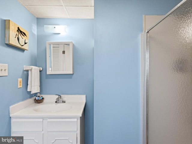 bathroom with an enclosed shower and vanity