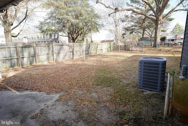 view of yard featuring central AC unit