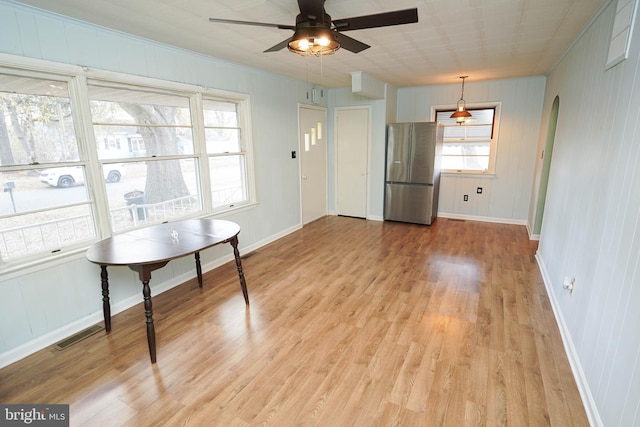 interior space featuring light hardwood / wood-style flooring and ceiling fan