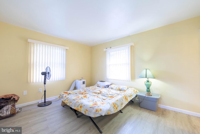 bedroom featuring light wood-type flooring